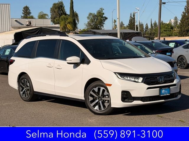 2026 Honda Odyssey EX-L in Platinum White Pearl — front three-quarter view